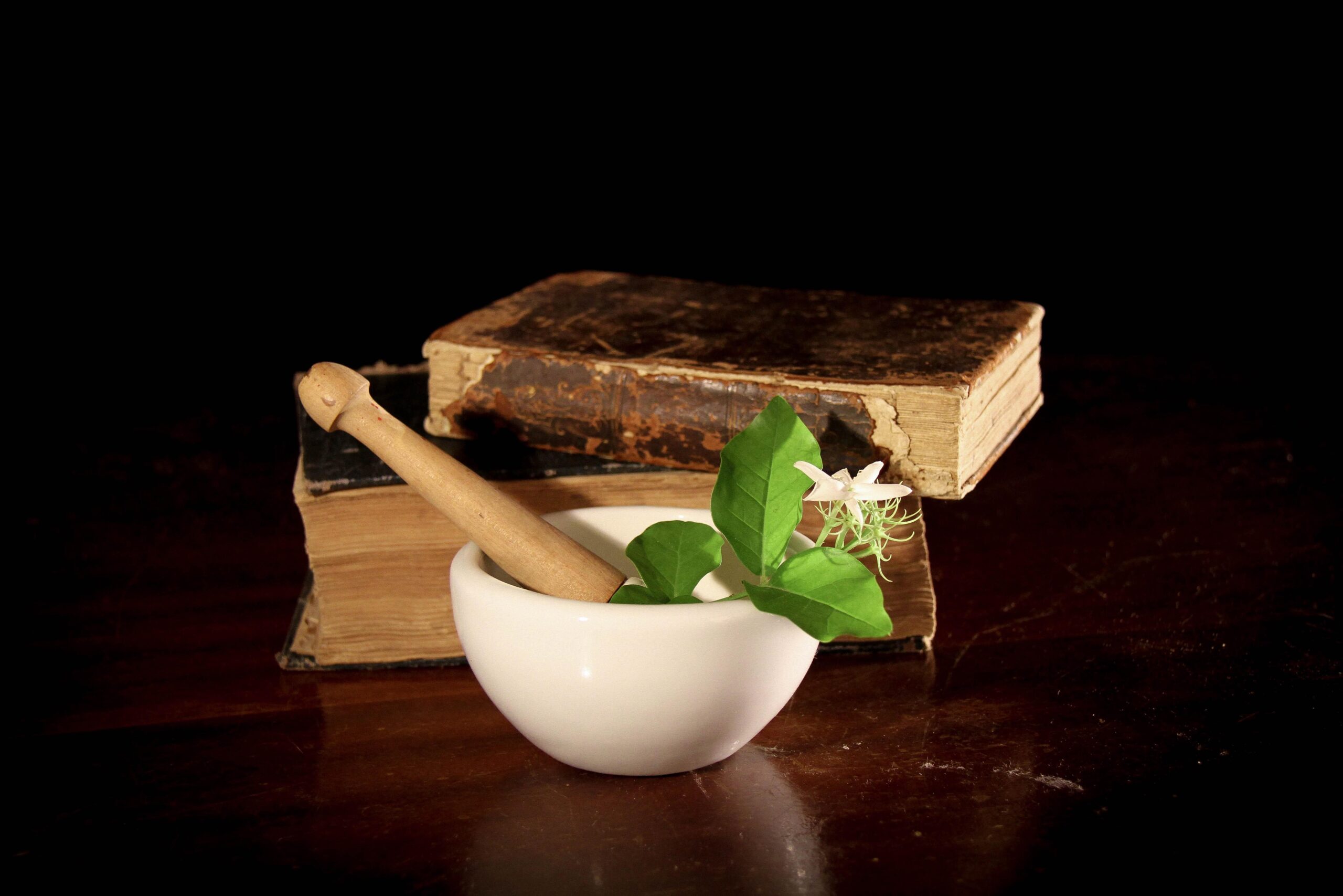 books and a bowl and mortar