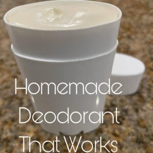 a white deodorant container filled with homemade deodorant on the counter, the words Homemade Deodorant that works is written on it