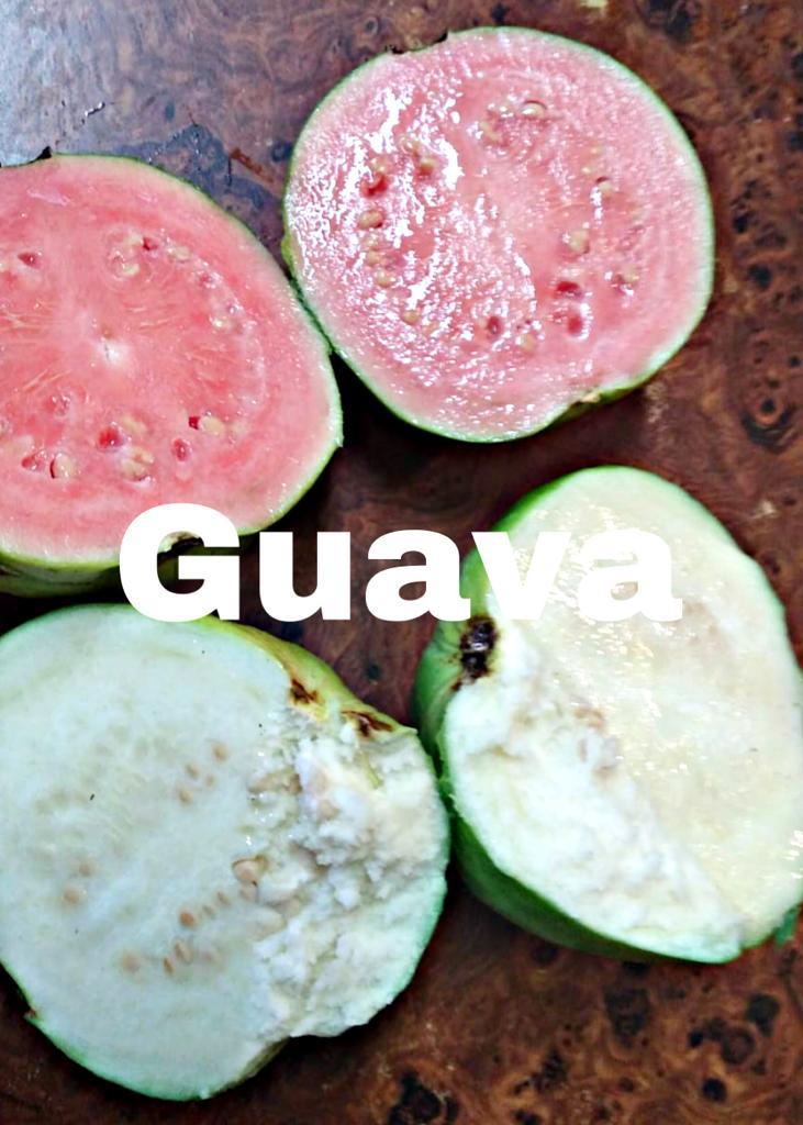 guava in 2 colors on a counter one pink and one white flesh