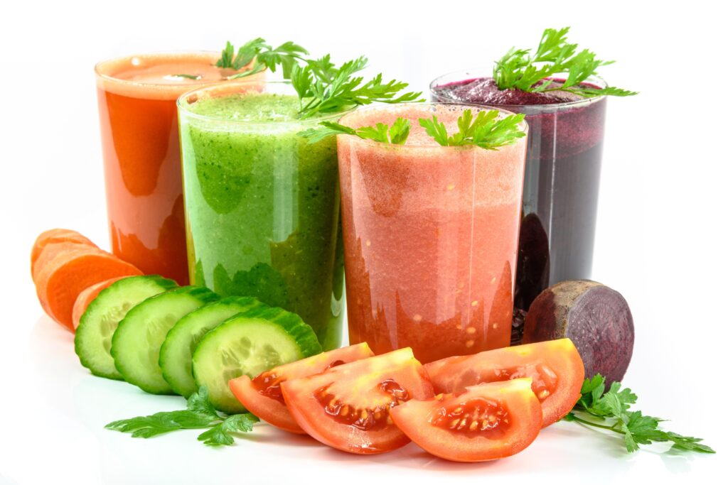 variety of juices in clear glass, cucumber juice, carrot juice cucumber juice, beet juice. for any and every chronic disease, 