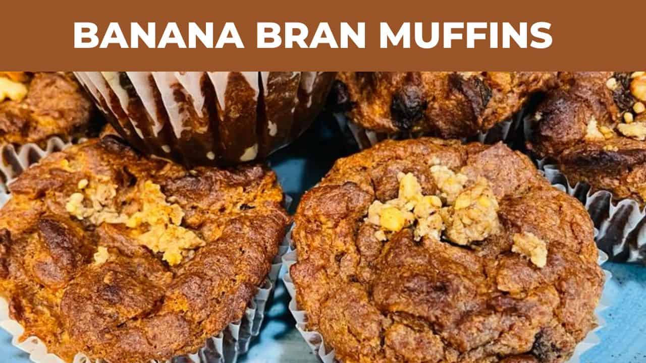BRAN MUFFINS PILE HIGH ON A BLUE PLATE